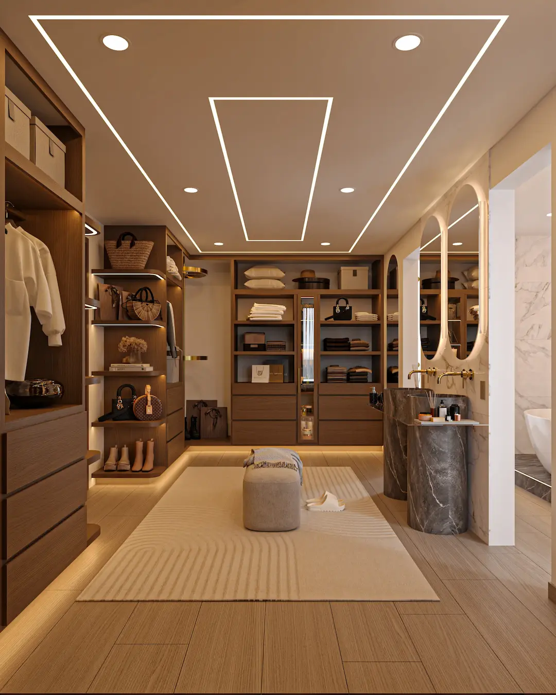 Vestidor principal con doble ovalín y diseño hotelero